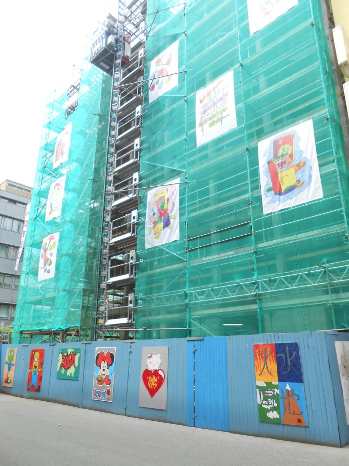 Schüler gestalten Riesen-Bilder für Fassade des PSD Bank-Rohbaus